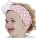 Faixa de cabelo rosa com bolinhas brancas.